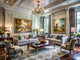 Modern living space adorned with classical art pieces and elegant decor